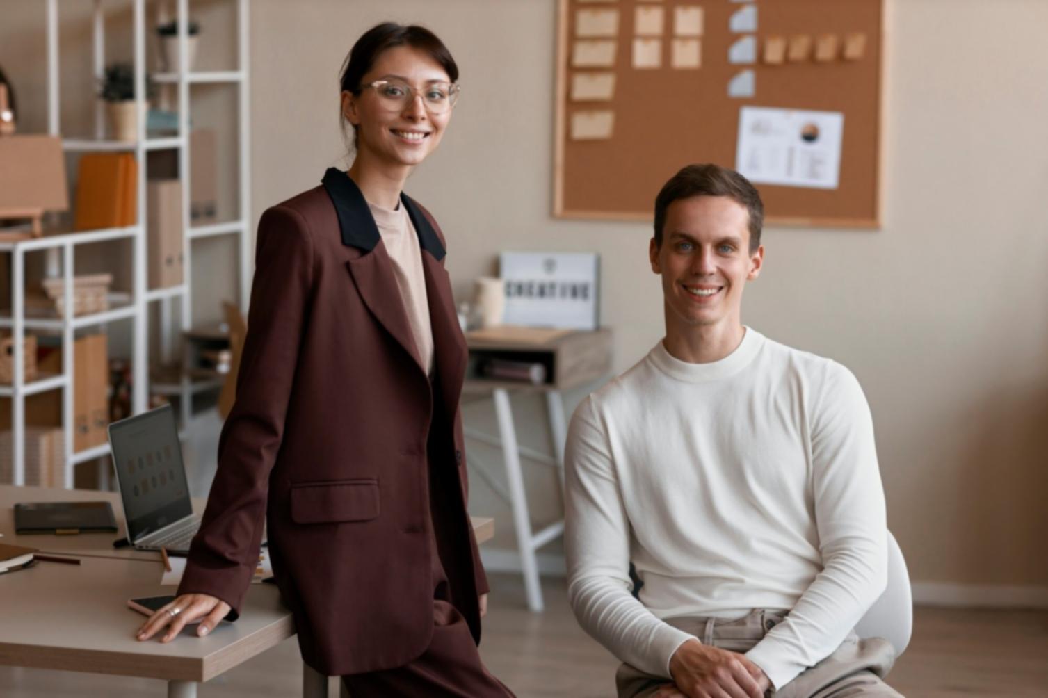 Person reviewing financial documents with laptop and calendar