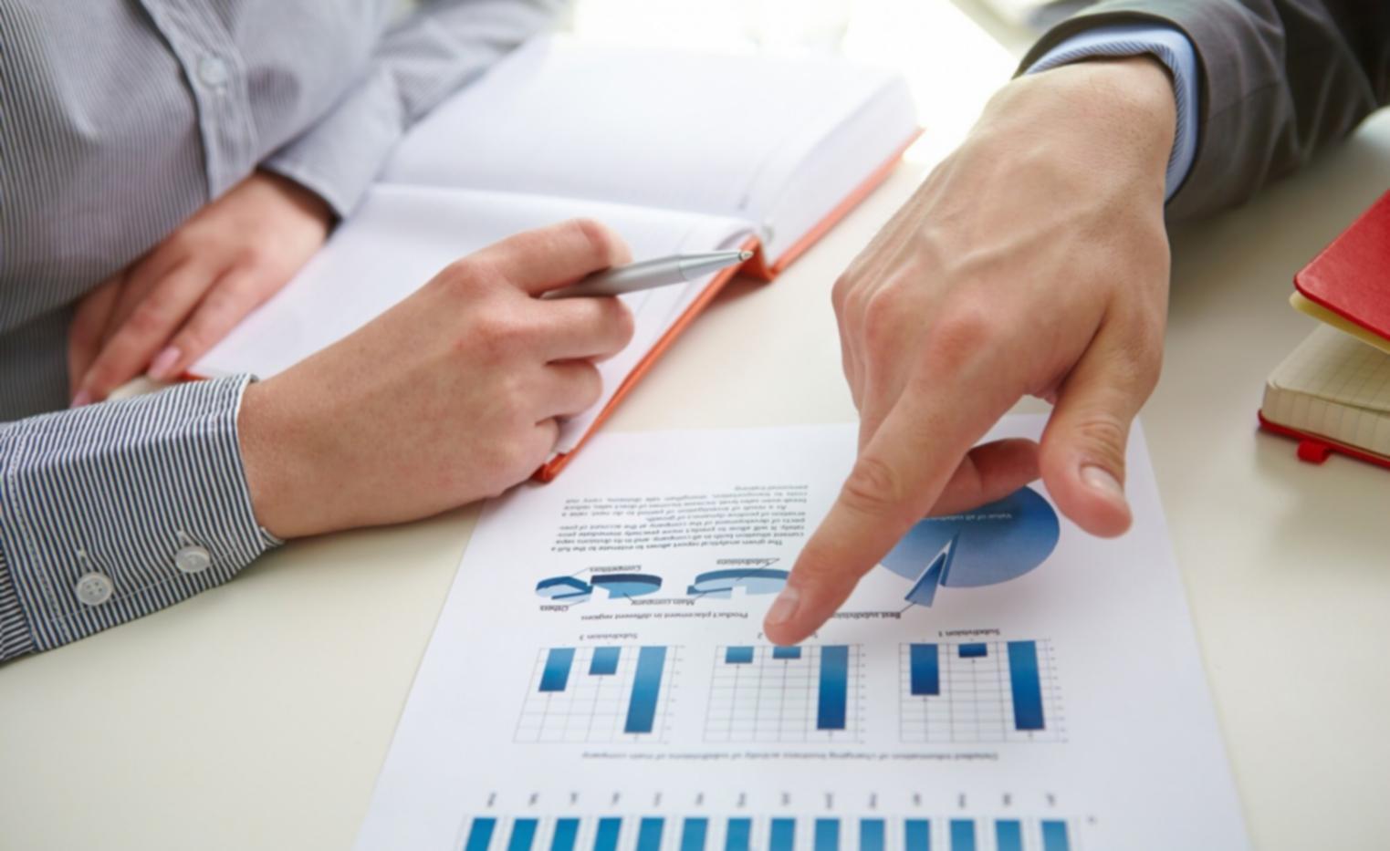 Financial planning materials and calendar layout on desk